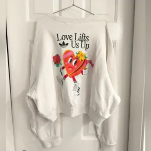 Adidas Nelson Crew White Love Lifts Us Up Special Edition Cropped Sweatshirt
