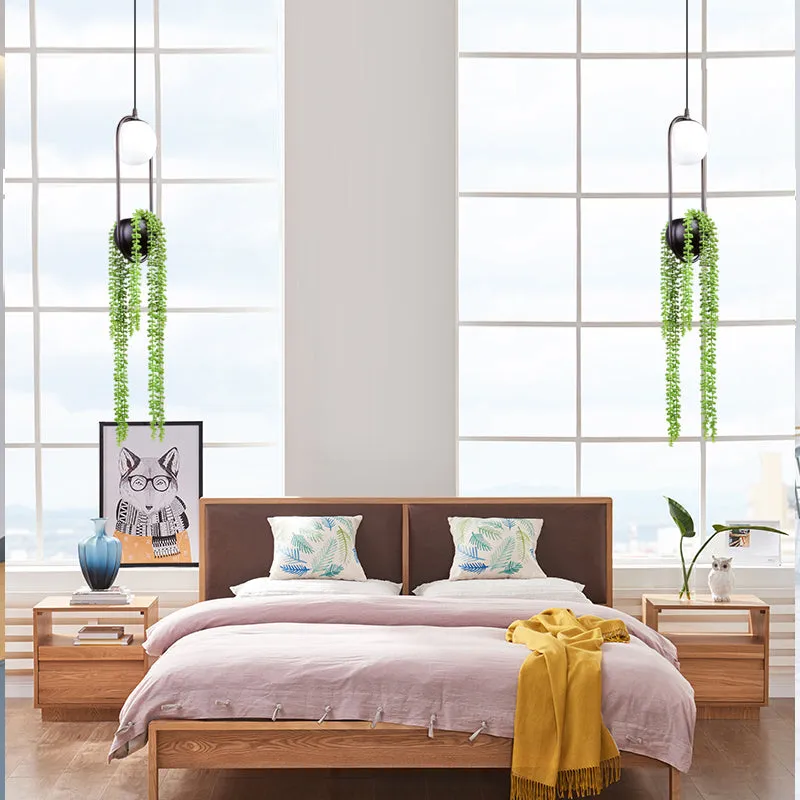 Hanging plant vase pendant light in brass