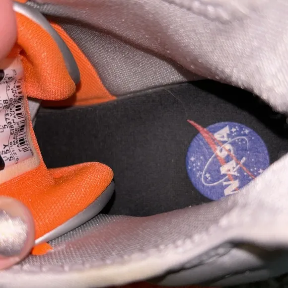 NASA themes Nike shoes. Size 5.5Y with very light wear-n-tear as seen in photos.