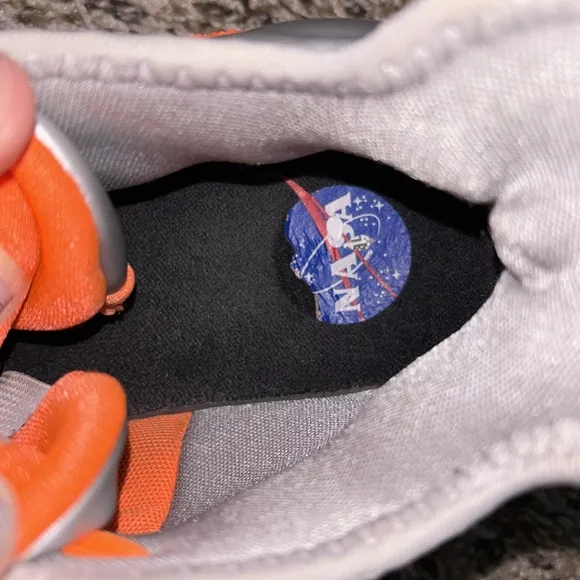 NASA themes Nike shoes. Size 5.5Y with very light wear-n-tear as seen in photos.