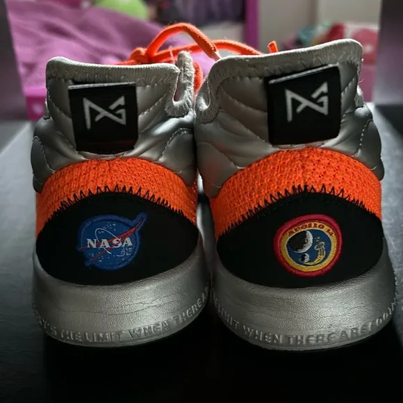 NASA themes Nike shoes. Size 5.5Y with very light wear-n-tear as seen in photos.