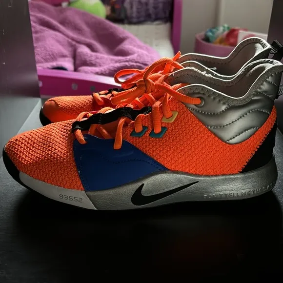 NASA themes Nike shoes. Size 5.5Y with very light wear-n-tear as seen in photos.